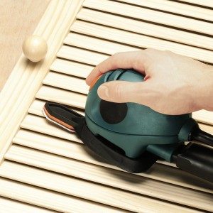 Set di cuscinetti abrasivi per dita LUX con mouse abrasivo che leviga una porta a lamelle.