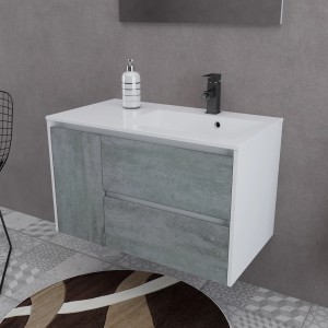 Mobile bagno moderno con lavabo, rubinetto e frontali grigi effetto cemento.