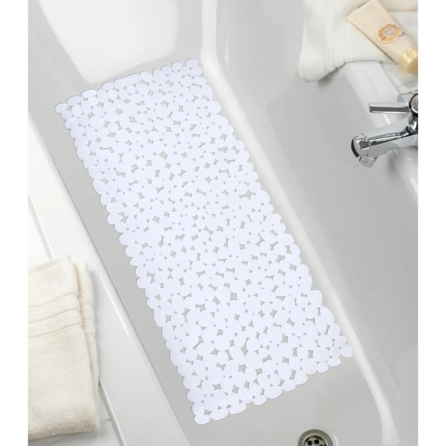 Tappetino per vasca bianco Wenko Paradise, 71x36 cm, con ventose nella vasca.