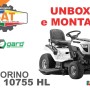 Trattorino tagliaerba: trattore da giardino bianco con sedile e volante neri.