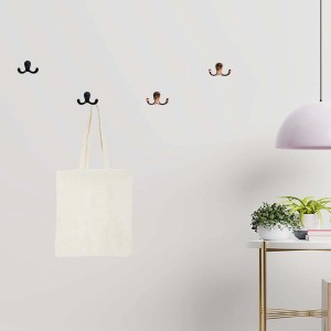 Appendiabiti da parete t.b.t. con ganci multipli in nero e rame.