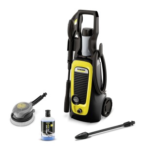 Idropulitrice giallo-nera con accessori come spazzola e detergente.