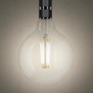 Lampadina LED E27 t.b.t. con vetro trasparente e base nera.