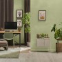 Soggiorno con pareti decorate in tonalità di verde. Pittura decorativa per un'atmosfera accogliente.