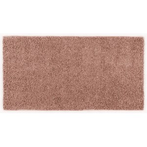 Tappeto a pelo lungo rettangolare color rosa.
