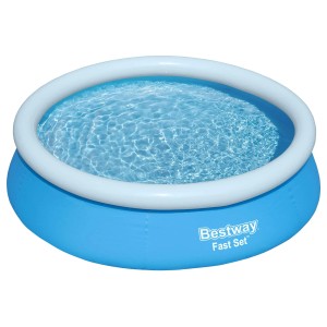 Piscina gonfiabile rotonda con vasca blu e bordo bianco, riempita d'acqua.
