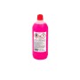 Flacone di detergente rosa con etichette di avvertimento. Detergente per varie superfici.