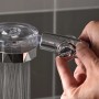 Doccetta t.b.t. con pulsante di arresto cromato azionata manualmente.