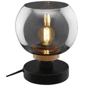 Moderna lampada da scrivania con paralume in vetro grigio e base nera.