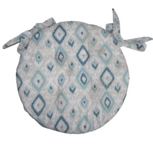 Cuscino rotondo con motivo a rombi blu-grigio e lacci.