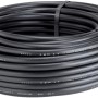 Tubo nero per microirrigazione, arrotolato e legato.