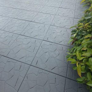 Piastrelle per esterni t.b.t. grigie con motivo irregolare per pavimentazioni.
