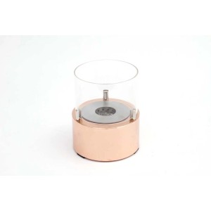 Camino decorativo t.b.t. con cilindro trasparente e base oro rosa.