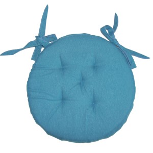 Cuscino rotondo turchese con lacci per sedie.