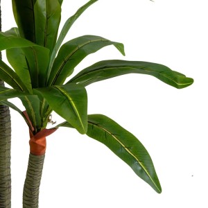 Dettaglio di una pianta artificiale con foglie verdi.