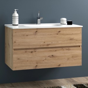 Mobile bagno sospeso effetto legno con due cassetti e lavabo da appoggio.
