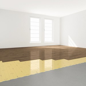 Installazione di Selitbloc® GripTec isolamento acustico sotto un pavimento in legno in una stanza.