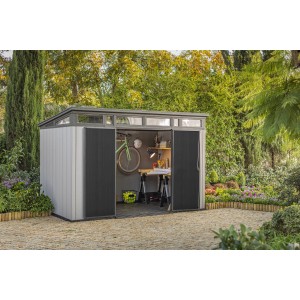 Casetta da giardino Keter Artisan 11x7 grigio-antracite con porte aperte e interni.