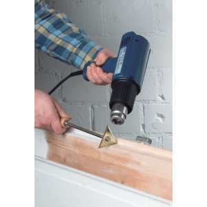 Applicazione: raschietto per vernice LUX con pistola termica che rimuove la vernice dal legno.