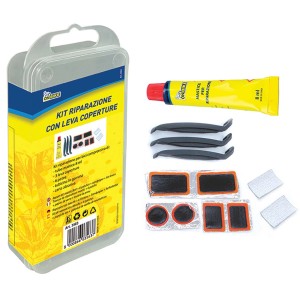 Kit riparazione bici con toppe, levagomme e colla per la manutenzione della bici.