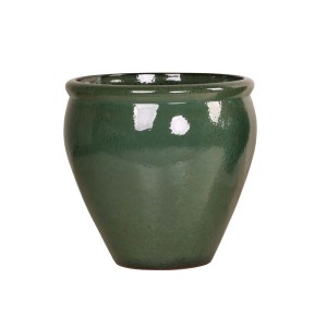 Vaso decorativo verde panciuto per interni.