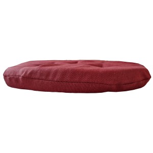 Cuscino rotondo bordeaux con bottoni, vista laterale.
