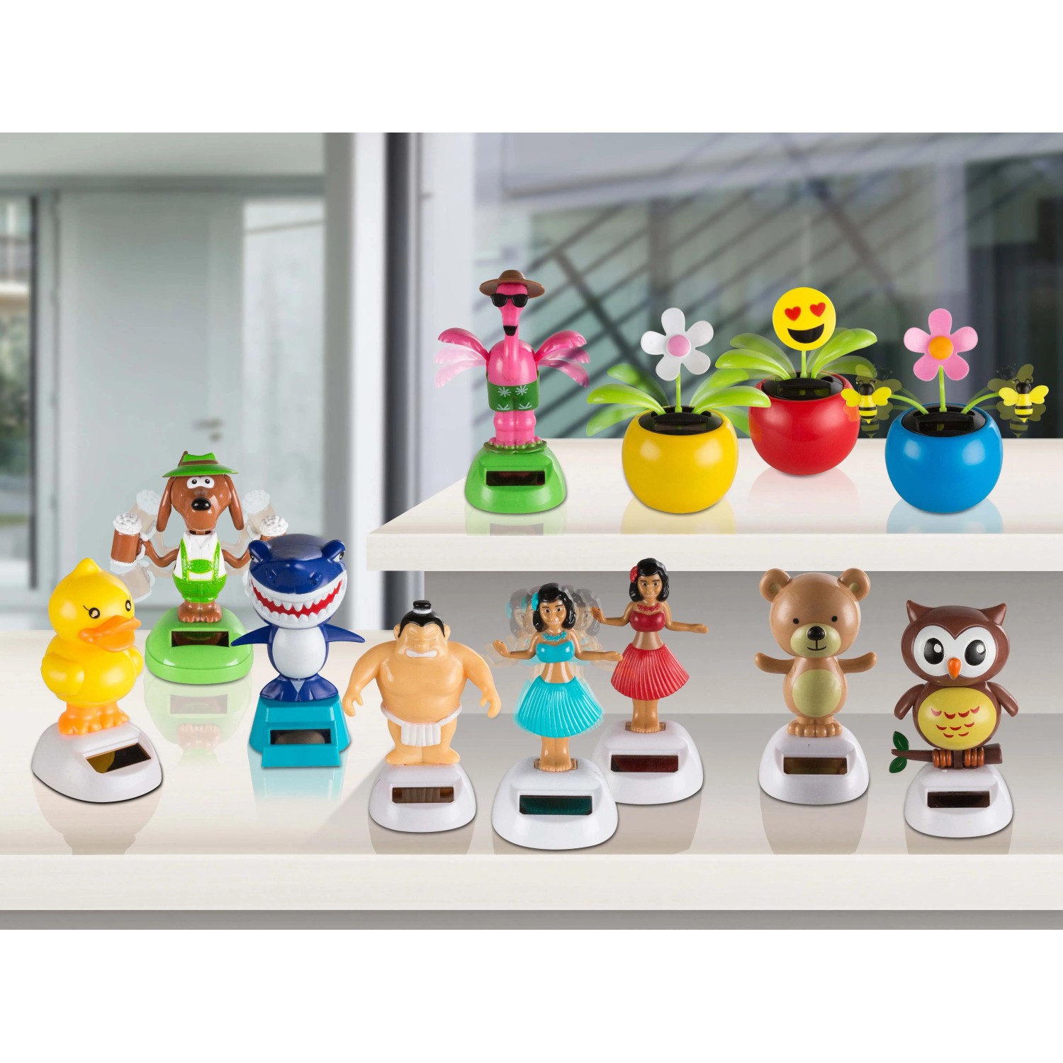 Figure solari decorative: anatra, squalo, orso, gufo e altre figure come decorazioni solari per il giardino.