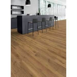Pavimento laminato t.b.t. effetto legno installato in ambiente moderno.