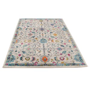 Tappeto vintage con motivo floreale in beige, blu, giallo e rosa.