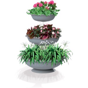 Ciotola per fiori grigia a tre livelli con vari fiori e piante.