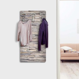 Appendiabiti t.b.t. con motivo pietra e due capi appesi.