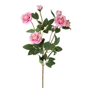 Fiore artificiale decorativo: rosa rosa con foglie verdi come elegante decorazione della stanza.