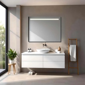 Specchio da parete rettangolare con illuminazione LED sopra il lavandino in bagno.