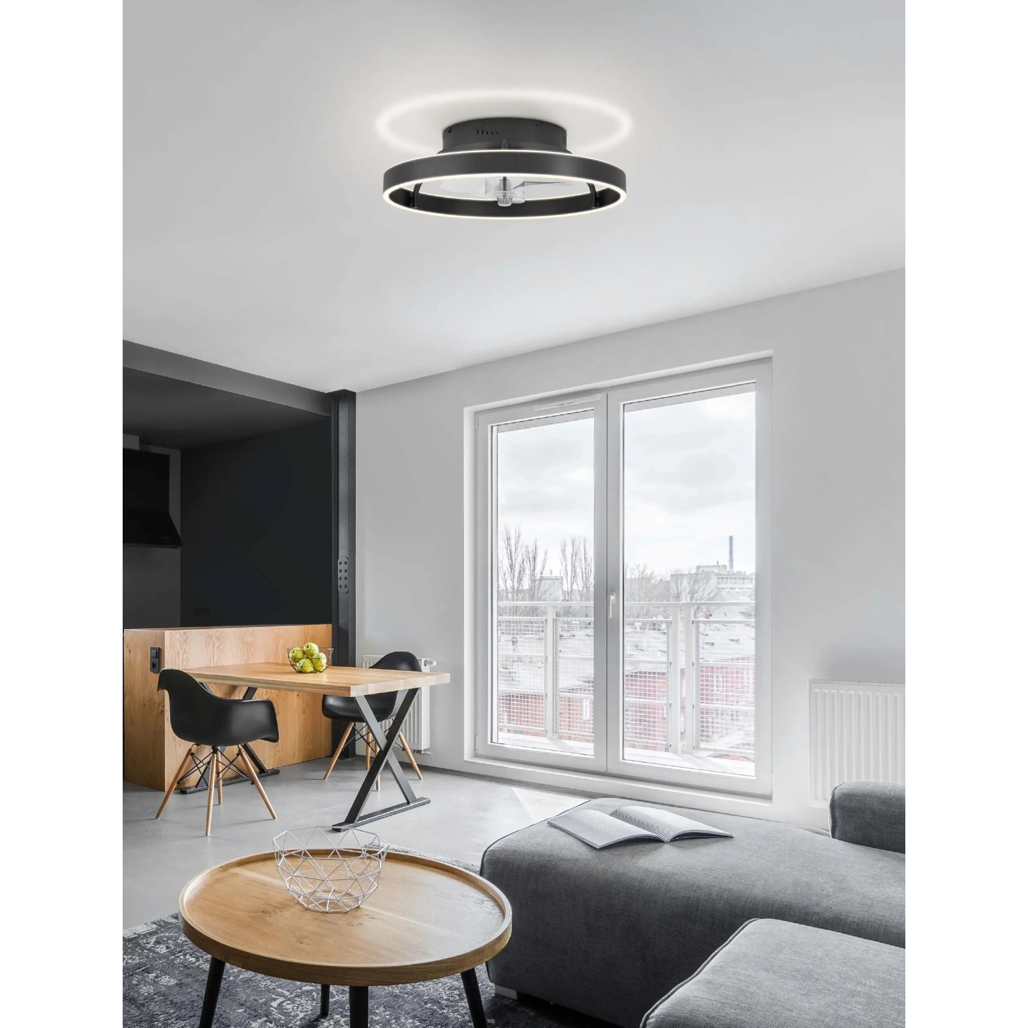 Plafoniera LED moderna t.b.t. in nero, design circolare per un'illuminazione elegante.