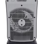 Termoventilatore elettrico grigio t.b.t. con griglia di protezione e base.