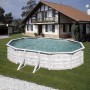 Piscina ovale Gre Finlandia con look nordico, 500x300x120 cm, bianco nordico. Piscina con pareti in acciaio in giardino.