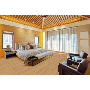 Pavimento in vinile chiaro posato in camera da letto. Atmosfera accogliente con il rivestimento.