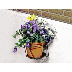 Portavaso da muro antracite Ø 20 cm con vaso piantato su una parete.