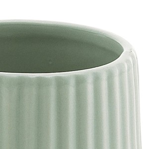 Dettaglio: Portaspazzolini t.b.t. verde con superficie scanalata.