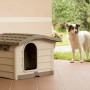Cuccia per cani beige con tetto marrone, adatta per uso esterno.
