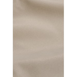 Primo piano del tessuto beige della tenda t.b.t.