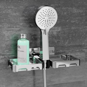 Soffione doccia con mensola per accessori doccia in bagno.