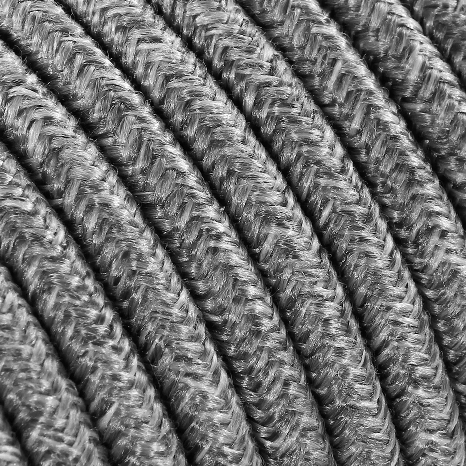 Cavo tessile grigio per lampade, dettaglio della struttura intrecciata.