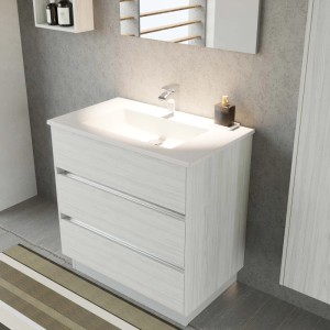 Mobile bagno t.b.t. con tre cassetti e lavabo da appoggio.