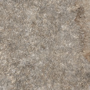 Primo piano di una piastrella in pietra naturale grigia con una texture fine.