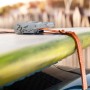Cinghia a cricchetto per fissare il carico, ad es. tavola da surf sul tetto dell'auto.