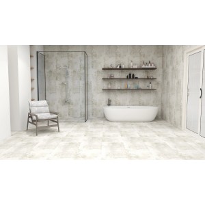 Bagno luminoso con pavimento vinilico t.b.t. effetto pietra, doccia e vasca.
