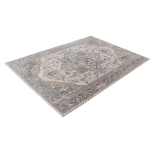 Tappeto vintage con motivo floreale in beige e grigio.