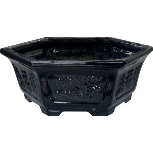 Portavasi t.b.t. nero ottagonale con motivo floreale.