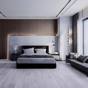 Stanza luminosa con pavimento vinilico t.b.t. effetto legno sotto un letto.